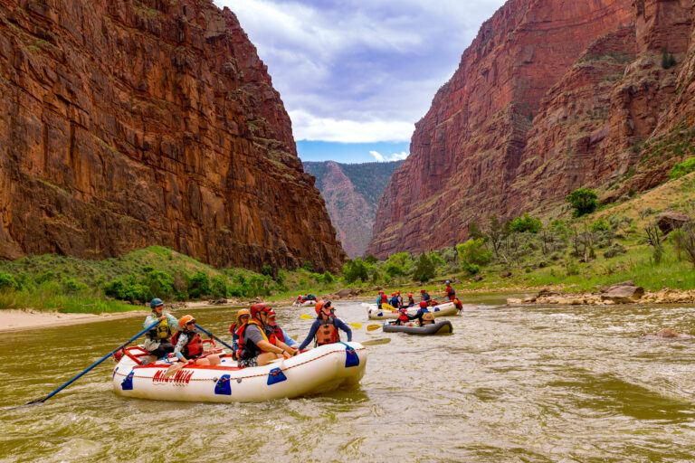 A fleet of rafts floating through the Gates of Lodore in Dinosaur National Monument - Mild to Wild