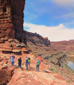 people standing at the top of the loop hike on cataract canyon