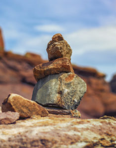 stacked rocks at the top of the cataract canyon loop hike