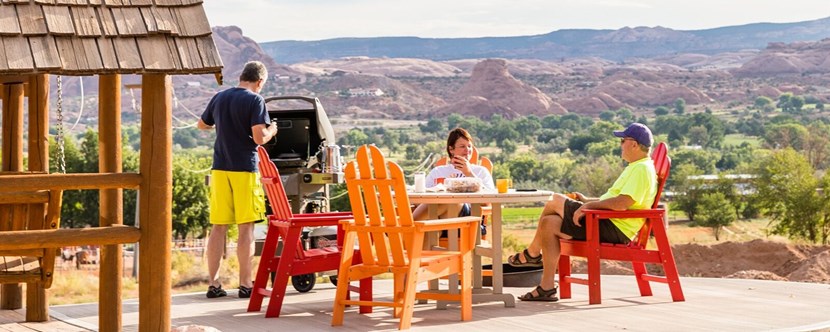 KOA Patio Guests Sitting - Moab UT - Mild to Wild Rafting