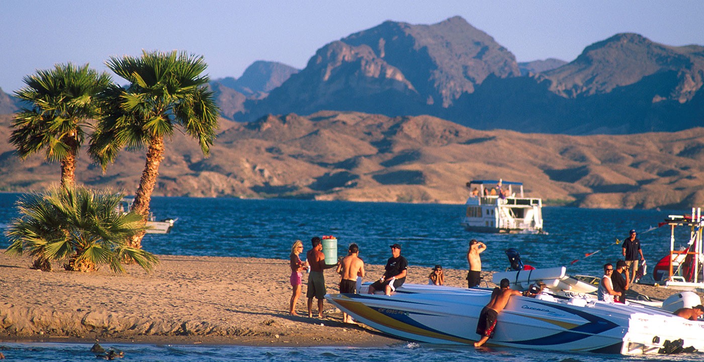 People on the beach of Lake Havasu - Mild to Wild