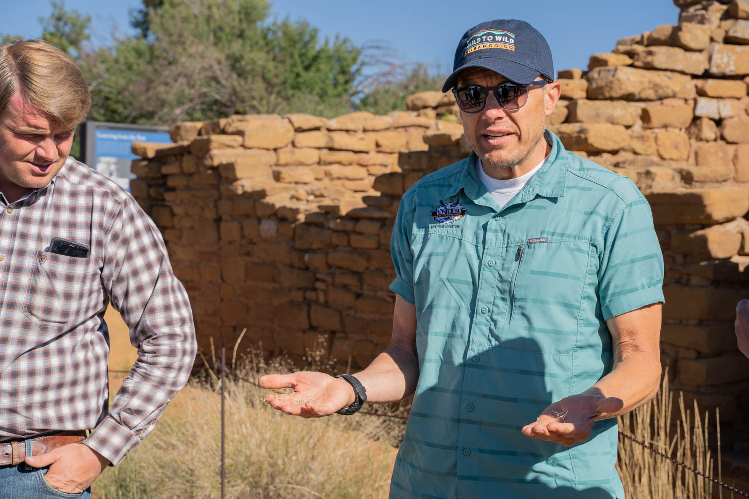 A Mesa Verde guide discusses the history of Coyote Village in Mesa Verde National Park