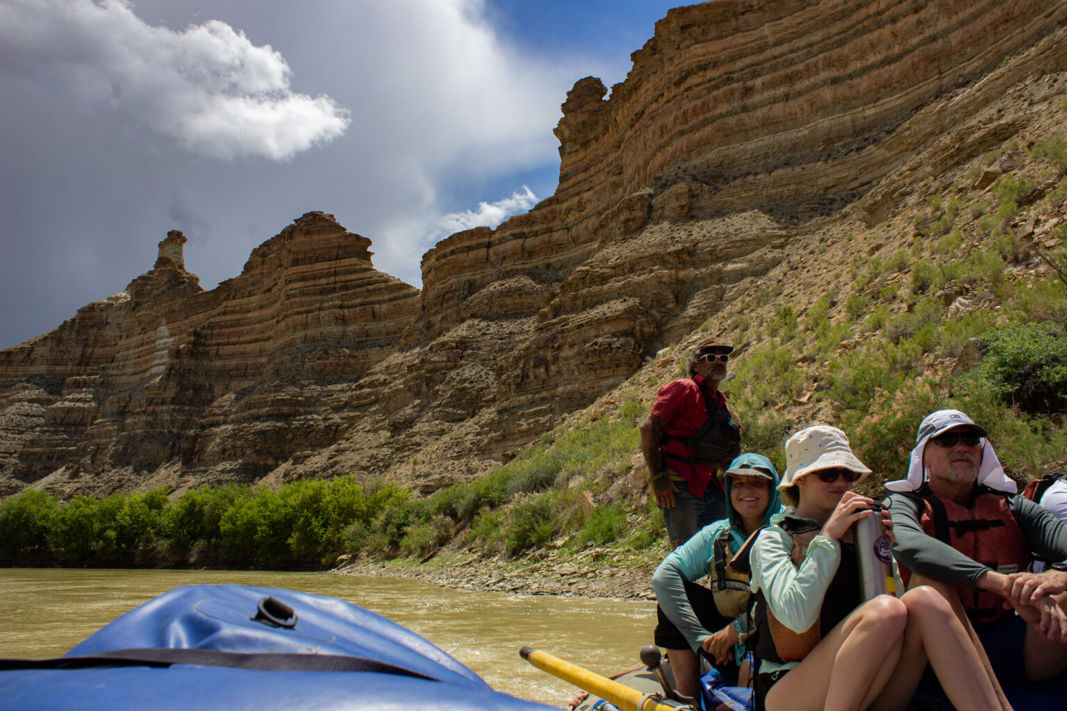 Guide motoring through the scenery in Desolation Canyon - Mild to Wild