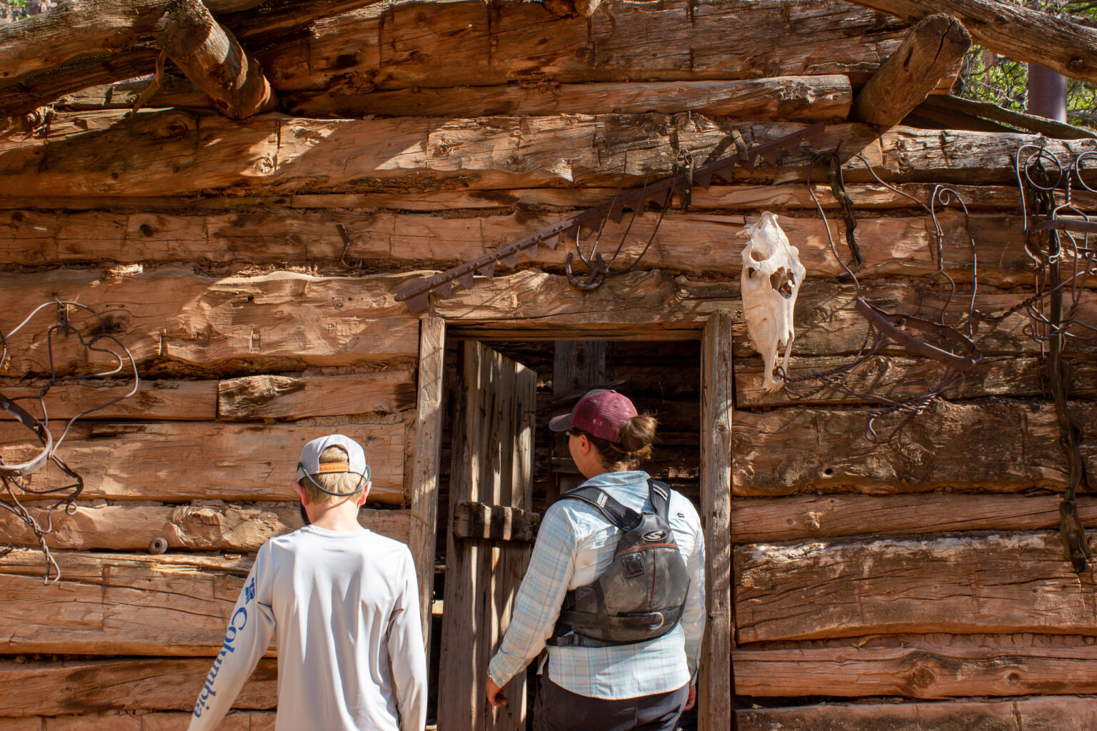 Guide walking into cabin at McPherson Ranch in Desolation Canyon - Mild to Wild