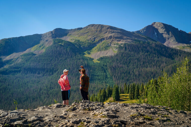 group of 3 in the middle of a wide shot of Molas Pass near Silverton CO - Mild to Wild