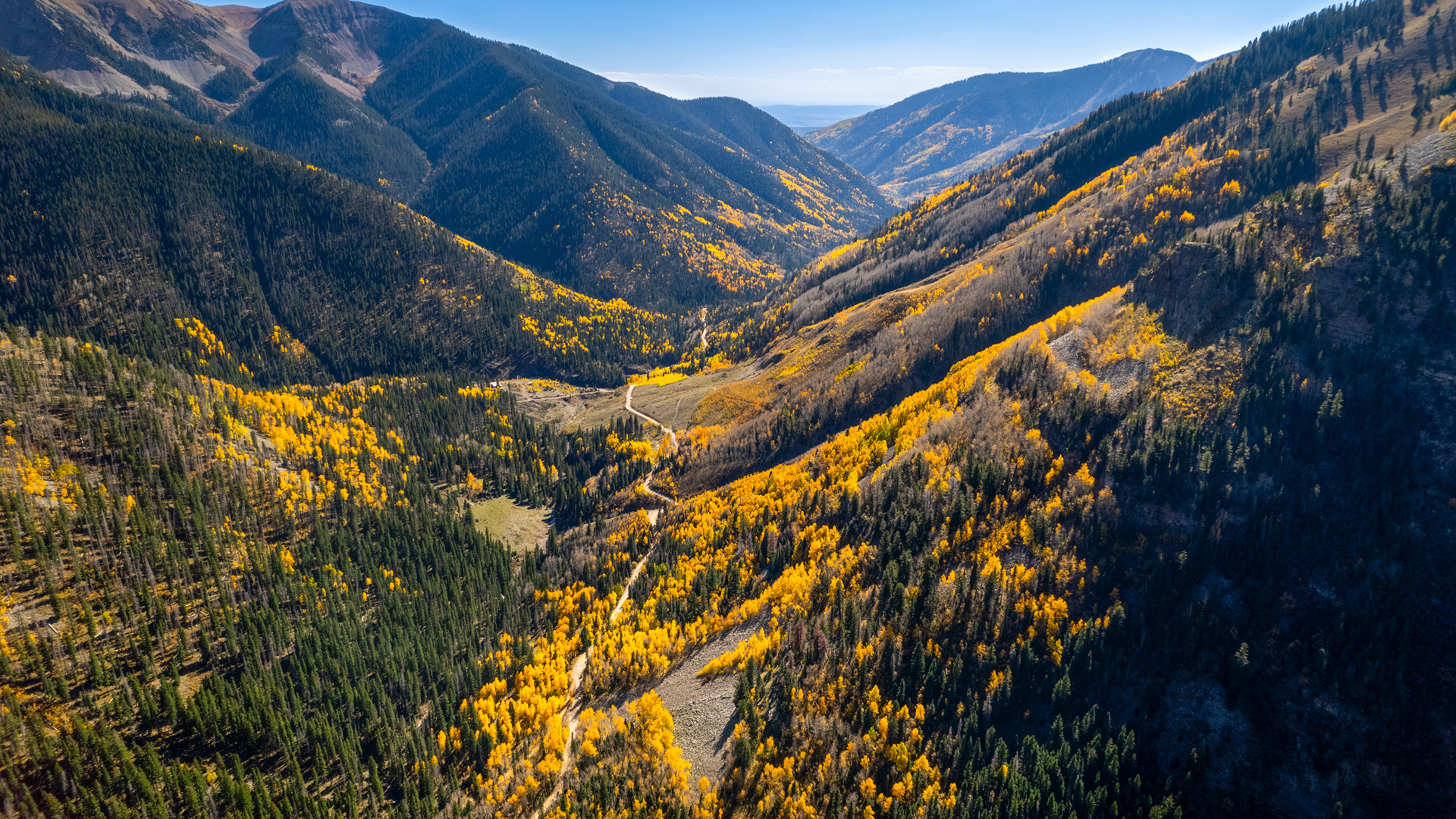 scenic landscape shot of la plata canyon with fall foliage - mild to wild