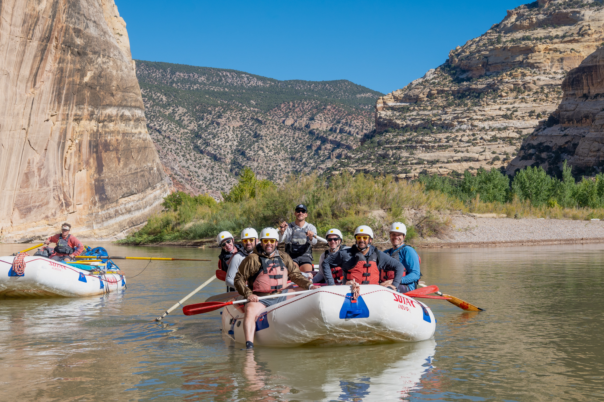 Group on raft in front of Echo wall in gates of Lodore - Dinosaur National Monument - Corporate Retreat - Mild to Wild Rafting